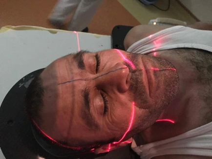 Drawing a central line on the patient’s face